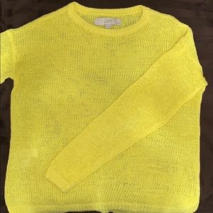 Bright yellow knit sweater